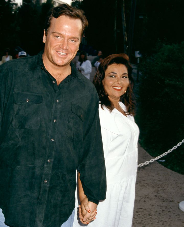 Tom Arnold and Roseanne Barr arrive for "An Evening At The Net" party in 1992 at UCLA's tennis center.
