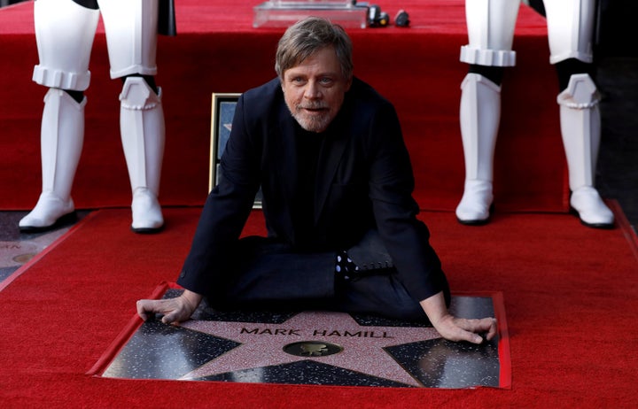 Actor Mark Hamill poses on his star on the Hollywood Walk of Fame after it was unveiled on March 8.