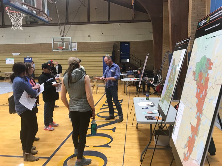 An official with the Bureau of Land Management fields questions during a public scoping meeting Monday evening in Blanding, Utah.