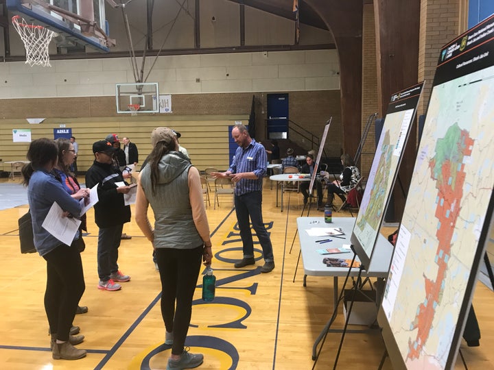 An official with the Bureau of Land Management fields questions during a public scoping meeting Monday evening in Blanding, Utah. 