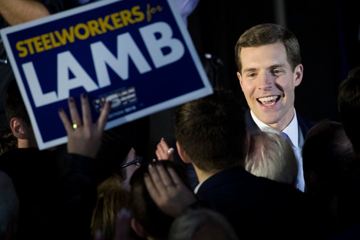 Democrat Conor Lamb greets supporters on the night of his upset victory in a congressional race in Pennsylvania.