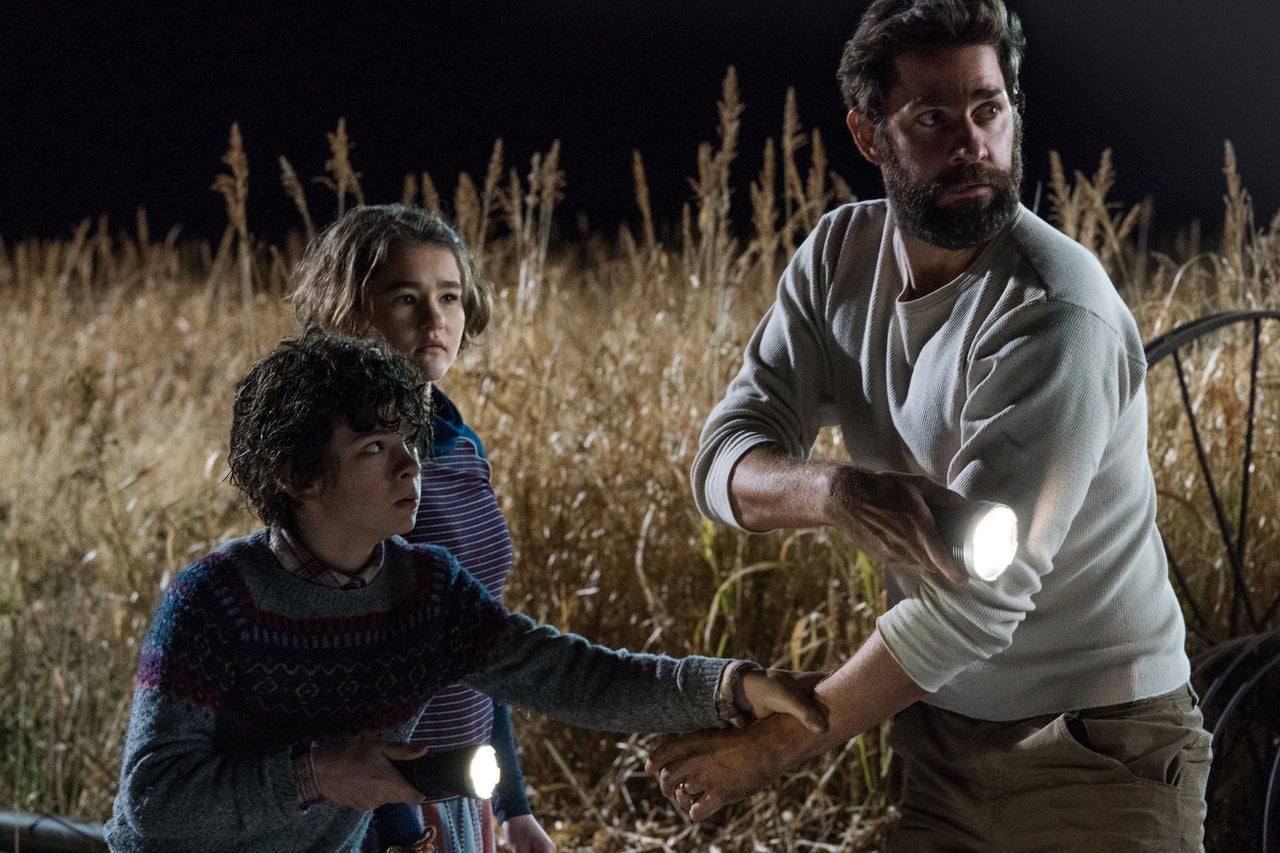 Noah Jupe, Millicent Simmonds and John Krasinski in "A Quiet Place."