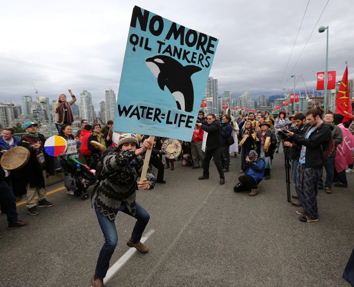 Protesters in Vancouver march against the proposed expansion of the Kinder Morgan Trans Mountain Pipeline.