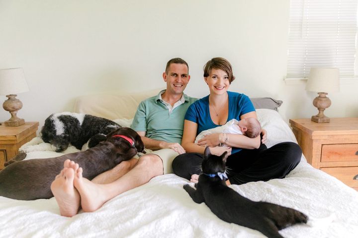 Julie Zack Yaste with her husband, Cameron, a naval officer, and their son, Jack.