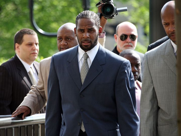 R Kelly arriving in court in 2008, where he was eventually found not guilty of videotaping himself having sex with a 13-year-old