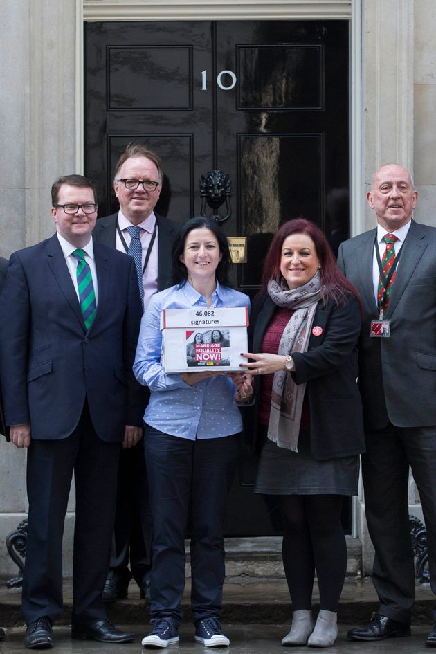 Partners Amanda McGurk (centre left) and Cara McCann (centre right) with Labour MP Conor McGinn (left) outside 10 Downing Street in London, as they deliver a petition of 46,082 signatures calling for same-sex marriage to be extended to Northern Ireland.