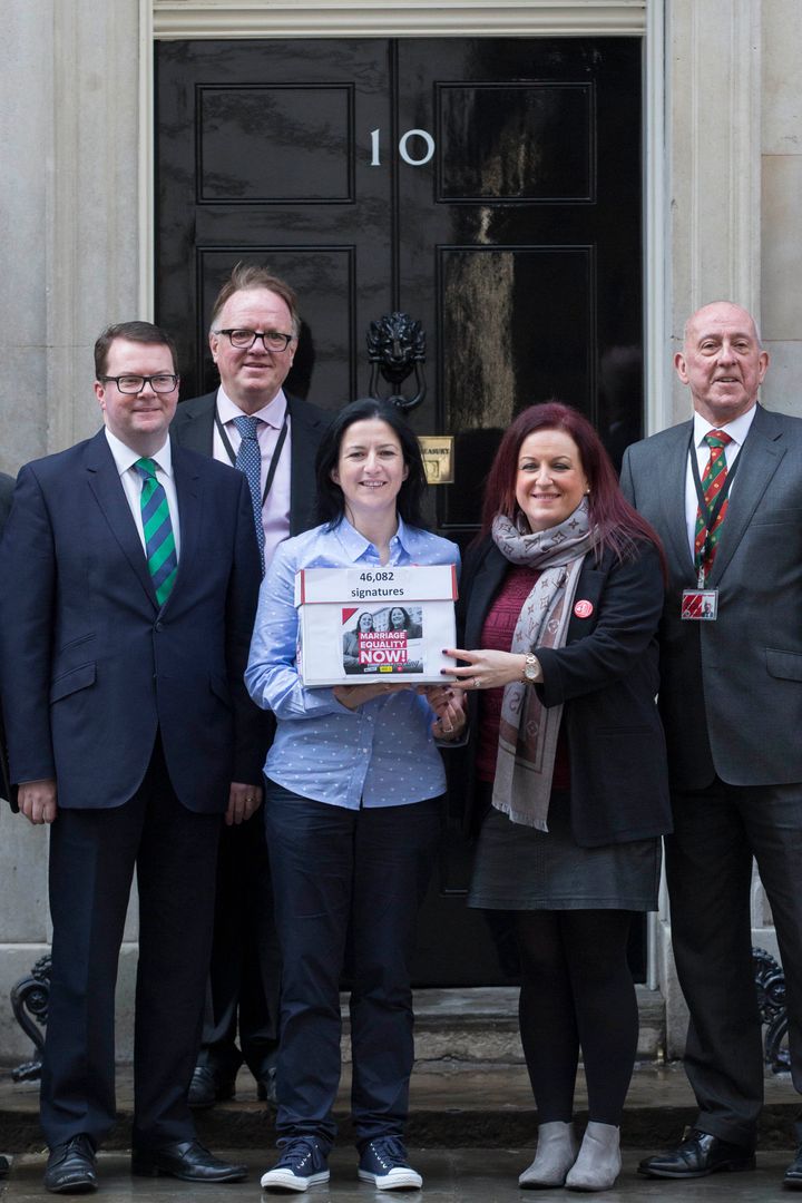 Partners Amanda McGurk (centre left) and Cara McCann (centre right) with Labour MP Conor McGinn (left) outside 10 Downing Street in London, as they deliver a petition of 46,082 signatures calling for same-sex marriage to be extended to Northern Ireland.