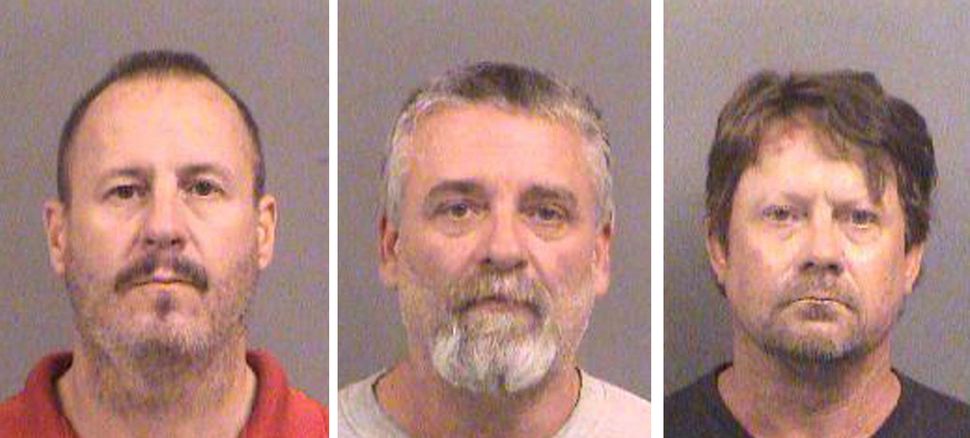 Curtis Allen, left, Gavin Wright and Patrick Eugene&nbsp;Stein are on trial in Kansas, accused of plotting to bomb an apartme