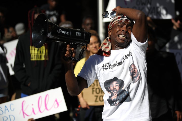 Stevante Clark, brother of Stephon Clark, speaks during a Black Lives Matter protest outside of office of Sacramento District