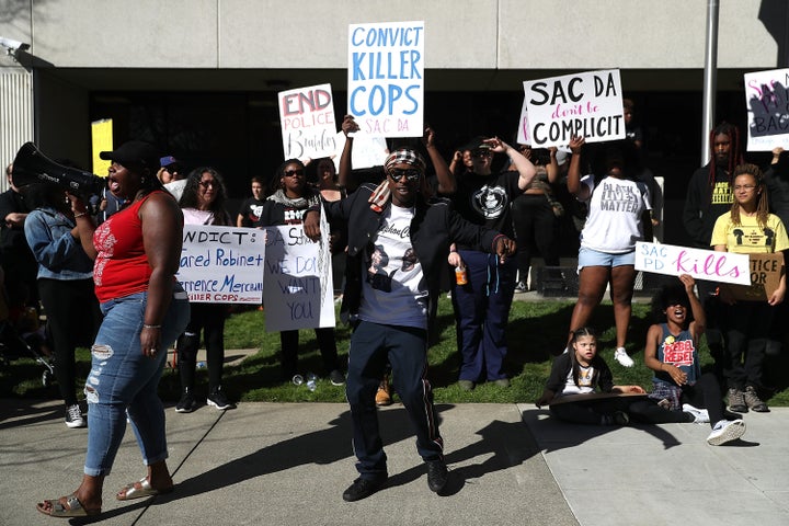 Stevante Clark, brother of Stephon Clark, speaks during a Black Lives Matter protest outside the district attorney's office in Sacramento.