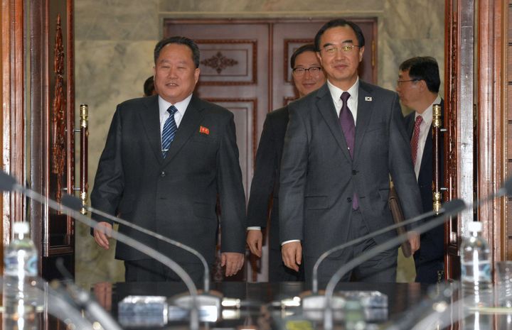 South Korean Unification Minister Cho Myoung-gyon and his North Korean counterpart Ri Son Gwon arrive for their meeting at the truce village of Panmunjom, North Korea, March 29, 2018.