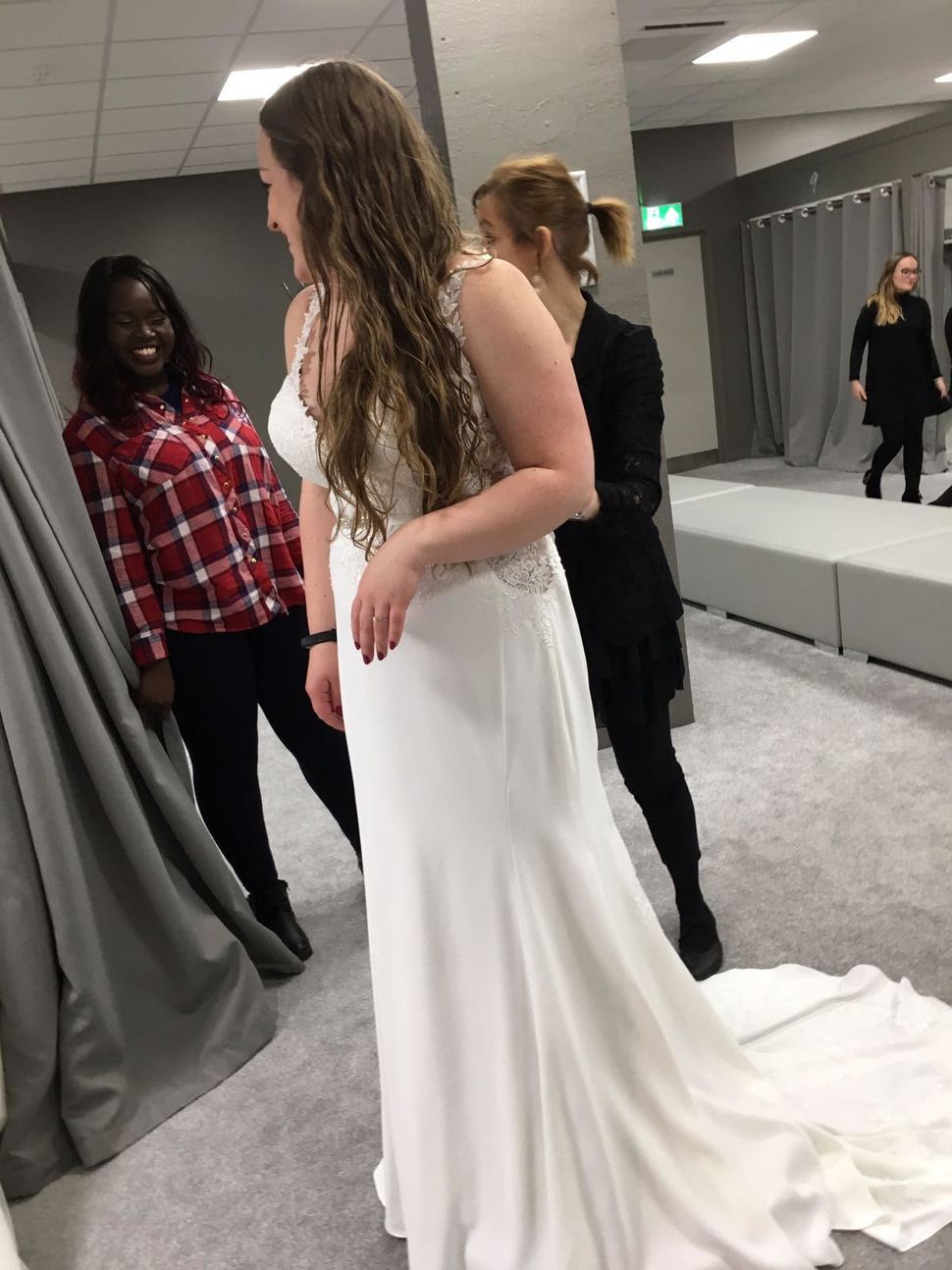 Alexia wearing one of the wedding dresses that didn't make the cut.
