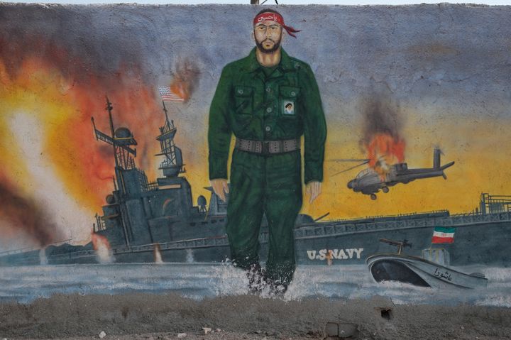 A mural on Hormuz Island depicts the past conflicts between Iran's revolutionary guard and the U.S. navy in the Strait of Hormuz.