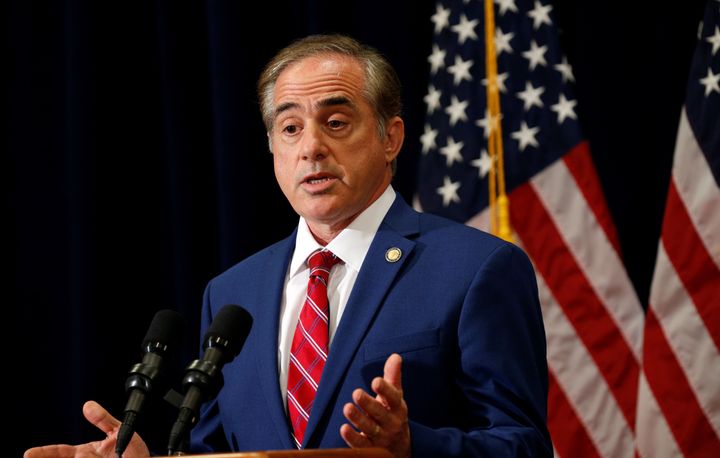 David Shulkin, seen here speaking to reporters in August 2017, was ousted by President Donald Trump on Wednesday.
