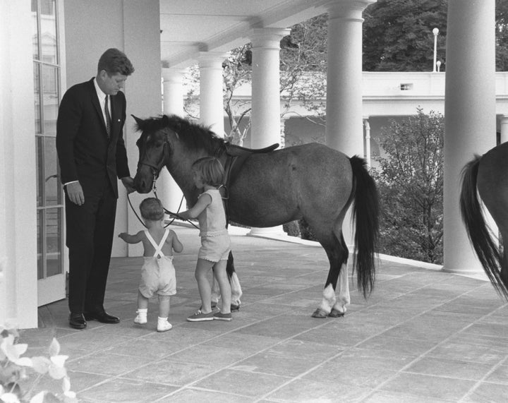 Kennedy with his children and their pony, Macaroni. 