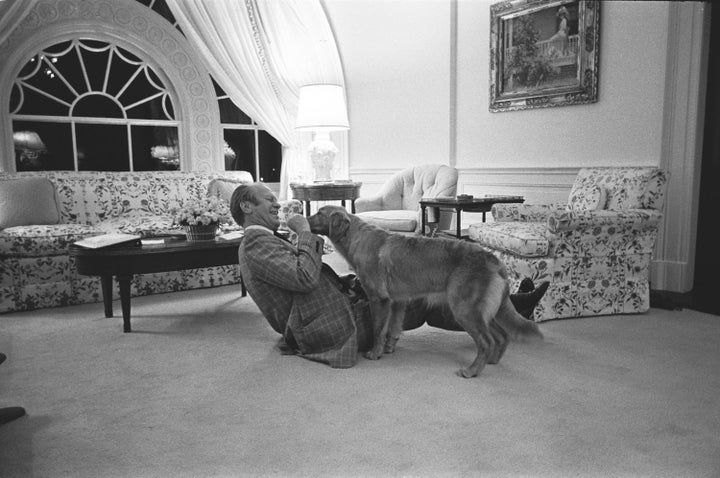 Ford playing with Liberty at the White House Executive Residence in 1975. 