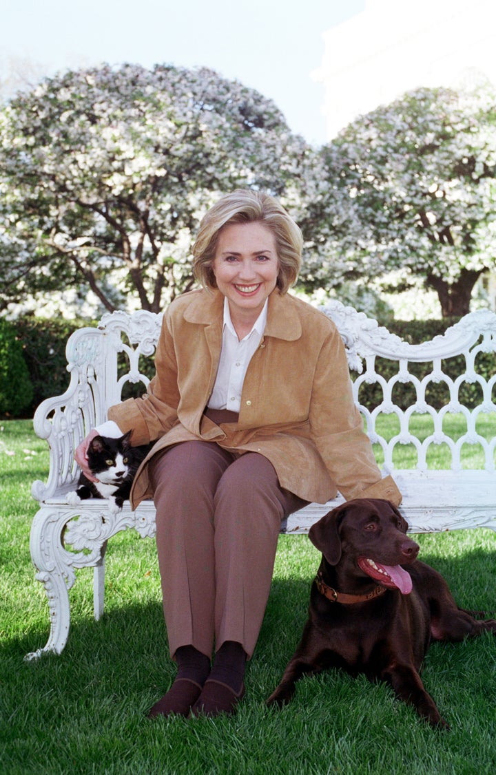 Then-First Lady Hillary Rodham Clinton poses with Socks and Buddy in 1999.