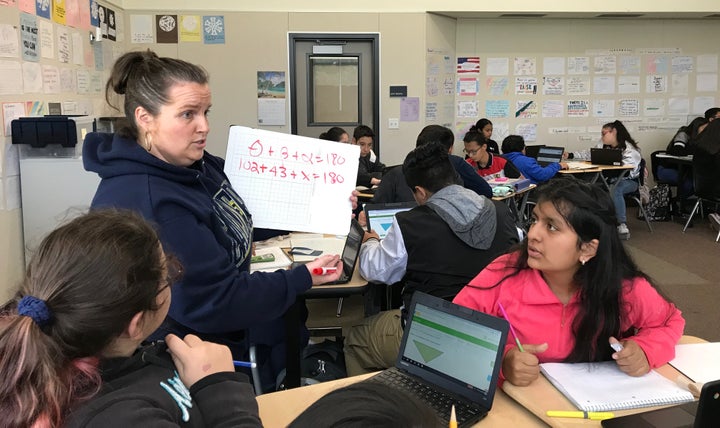 Jami Jorgensen, a math teacher at Martin Luther King Jr. Middle School in Hayward, teaches her students songs to help memoriz