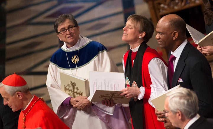 Rev. Kirbyjon Caldwell (top right) attends the presidential inaugural prayer service at the Washington National Cathedra