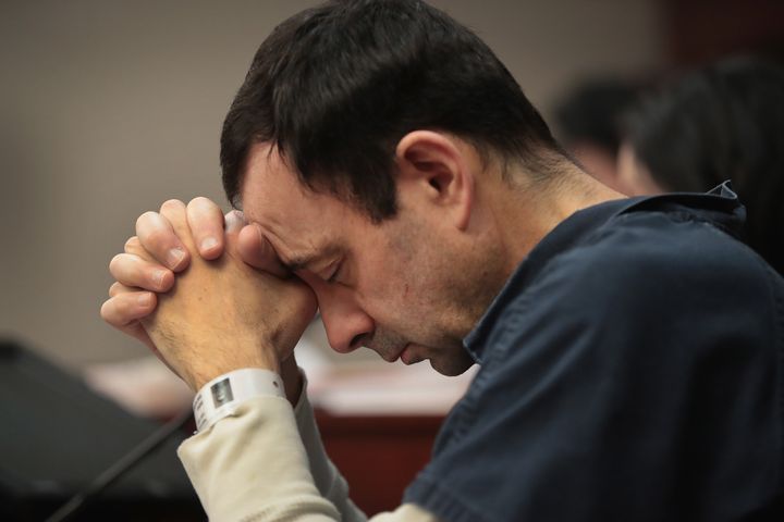 Larry Nassar listens to victim impact statements during a sentencing hearing on Jan. 16, 2018.