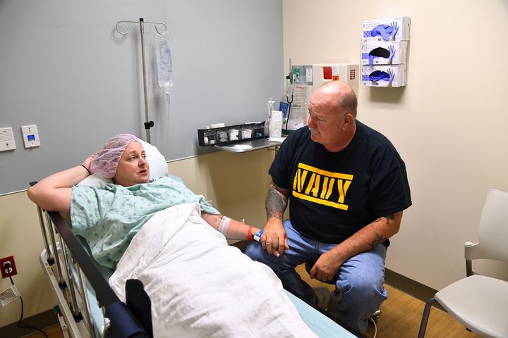 Melissa Davis Gilbert talks with her husband, Dan, before surgery to remove her fallopian tubes and uterus on May 24, 2017 in Rockville, Maryland. Gilbert had a hysterectomy to remove her Essure device due to worsening symptoms. 