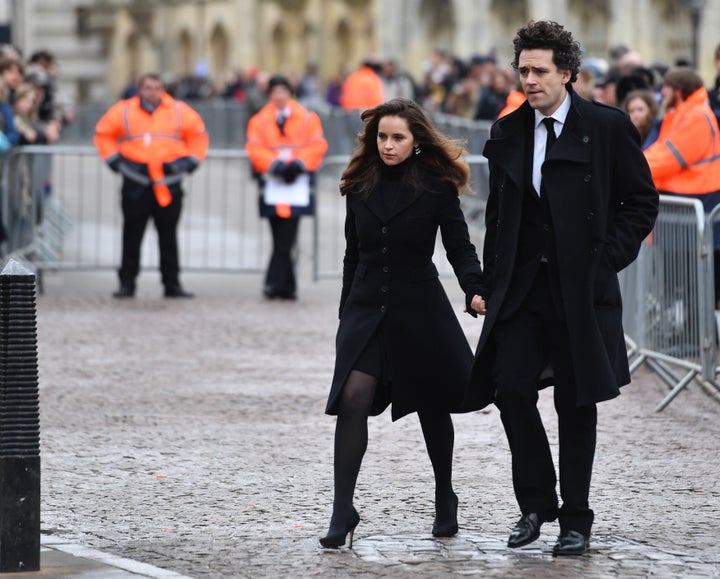 Felicity Jones, who played Hawking's first wife Jane in the film Theory Of Everything, arrives for the funeral with her partner Charles Guard