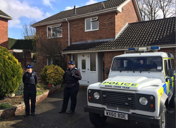 Police Community Support Officers standing outside the Salisbury home of Sergei Skripal
