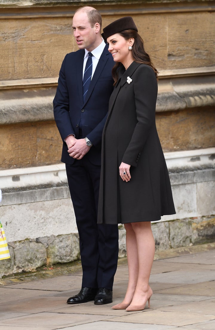 The duchess wore a black coat and matching hat.