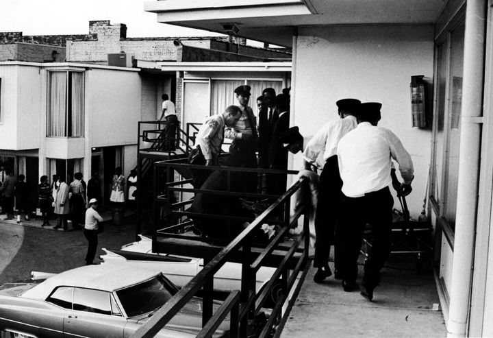 Memphis police officers and civil rights leaders prepare to move the body of Martin Luther King Jr. after his assassination on the balcony of the Lorraine Motel on April 4, 1968. 