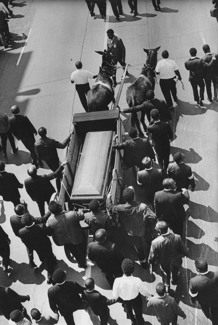 An overhead shot of Dr. Martin Luther King Jr.'s casket, during the procession from Ebenezer Baptist Church to Morehouse College.