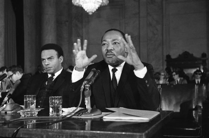 King, alongside the Rev. Andrew Young, executive vice president of the Southern Christian Leadership Conference, speaking on March 2, 1968, says the “poor people’s campaign” is demanding action by Congress to provide jobs for the poor. 