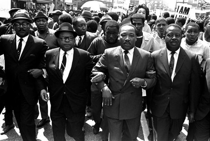 King is flanked by Abernathy, right, and Bishop Julian Smith, left, during a civil rights march in Memphis on March 28, 1968. 