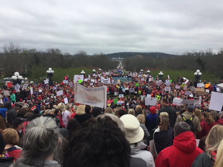 Overflow crowds spread down the Capitol steps as thousands of protesters gather in Frankfort, Kentucky, on Monday.