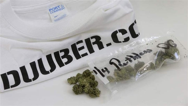 <p>Marijuana and a T-shirt from Massachusetts pot delivery company Duuber.com. Companies like Duuber exploit loopholes in state law that allow people to give away or “gift” up to an ounce of marijuana. The Duuber T-shirt cost $100 but the marijuana was a gift.</p>