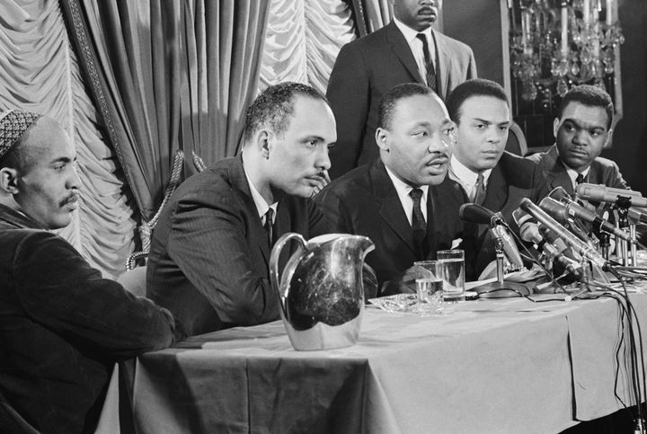 Dr. Martin Luther King Jr., center, announcing on Jan. 7, 1966, a freedom movement to be launched in Chicago. 