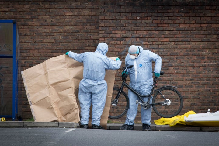 Forensic officers at the scene where a 16-year-old boy was shot on Monday evening in Walthamstow, east London.