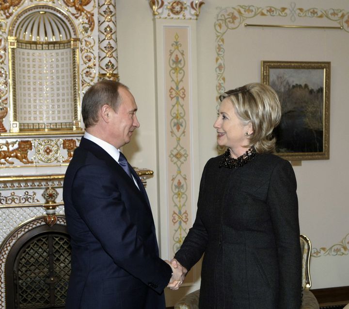 Hillary Clinton, pictured with Vladimir Putin in 2010, called the Russian leader a "world-class misogynist" on Tuesday.