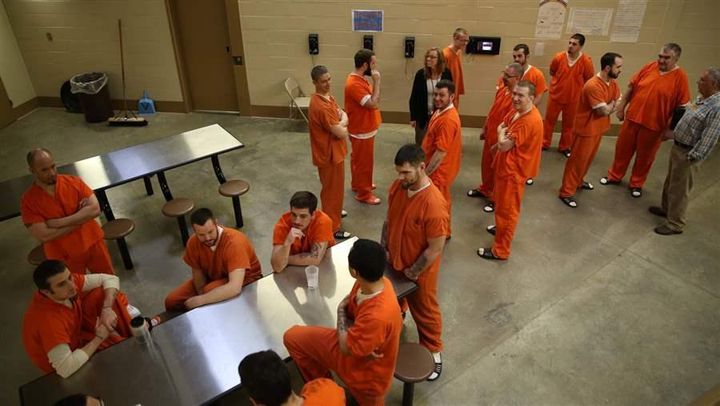 Inmates in a drug treatment program in Knox, Indiana, wait for lunch. Nationwide, few prisons or jails offer medication-assisted treatment to inmates.