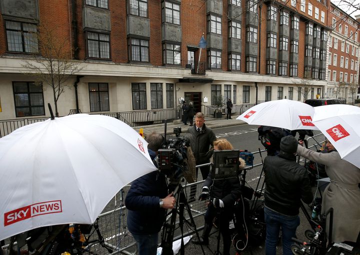 Television crews and other media wait outside the King Edward VII's Hospital on Wednesday.