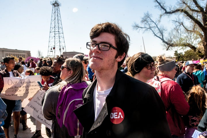 Cameron Olbert, a sophmore at Classen School of Advanced Studies, stands in front of the Oklahoma state capitol on the third day of a statewide teacher walkout.