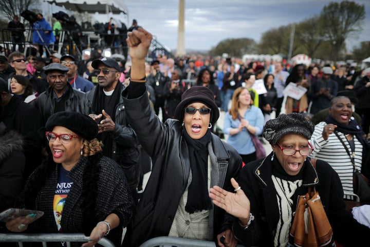 Marchers participate in an anti-racism rally in Washington, D.C., on Wednesday, the 50th anniversary of Martin Luther Ki