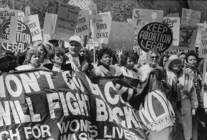 A National Organization for Women rally for abortion rights includes former NOW President Eleanor Smeal, left, NARAL leader Kate Michelman (3rd from left), Rep. Maxine Waters, then-Senate candidate Carol Moseley Braun, Gloria Steinem and former Rep. Bella Abzug.