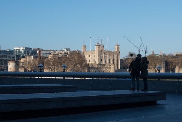 Temperatures are expected to be in the double-digits for most parts of the UK today and Friday; a couple is seen above taking a selfie near the Tower of London earlier this month 