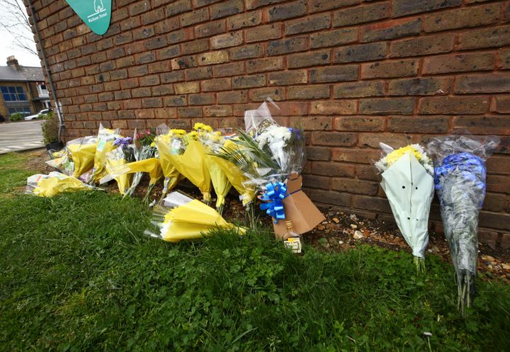Flowers are left at the scene following the death of Amaan Shakoor who was shot on Monday night in Walthamstow, east London