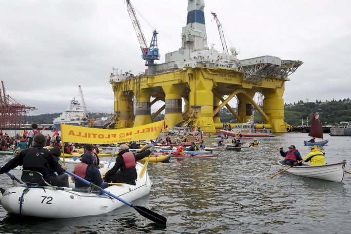 Activists protest the Shell oil drilling rig Polar Pioneer, parked at the Port of Seattle, on May 16, 2015.