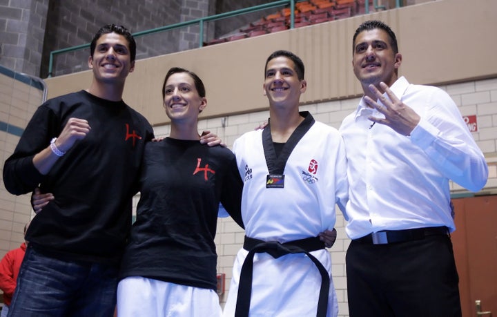 Steven Lopez, Diana Lopez, Mark Lopez and Jean Lopez at the Olympic trials for taekwondo on April 5, 2008, in Des Moines, Iow