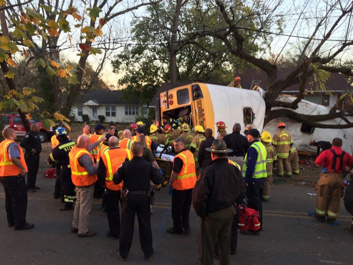 Rescue officials are seen at the scene of a fatal school bus crash in Chattanooga, Tennessee, Nov. 21, 2016.
