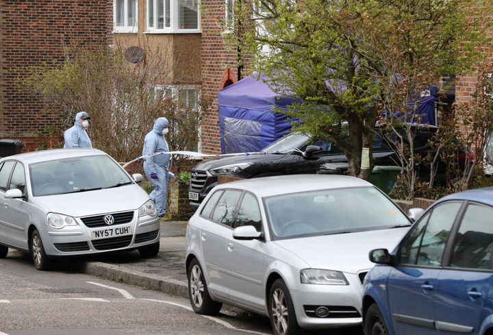Forensic officers at the scene in South Park Crescent in Hither Green, London, after a pensioner was arrested on suspicion of murder after fatally wounding an intruder during a suspected burglary at his home.