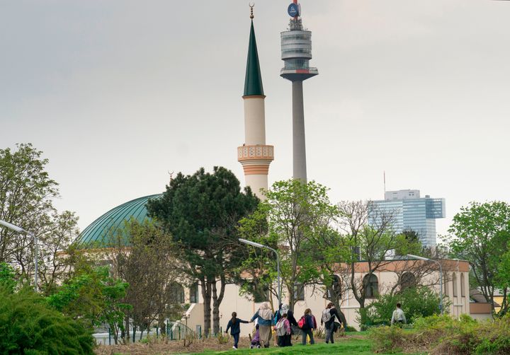 Muslim women and children walk toward a mosque at the Islam Centre of Vienna on April 14, 2017.