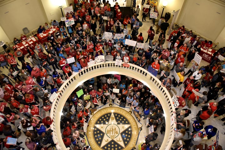 Teachers pack the Oklahoma Capitol rotunda on the second day of a teacher walkout to demand higher pay and more funding for education on April 3, 2018.